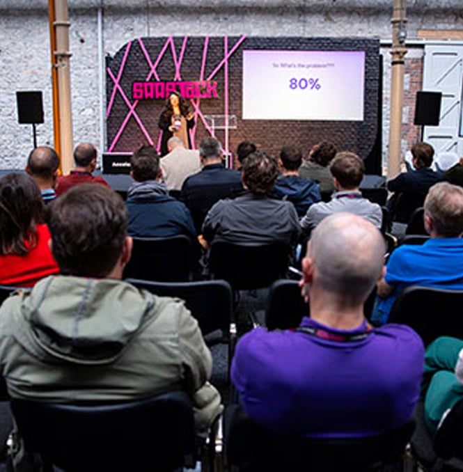 Angeley Mullins delivering keynote at SaaStock